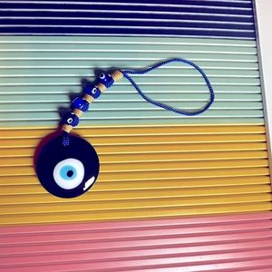 Glass Turkish evil eye hanging.